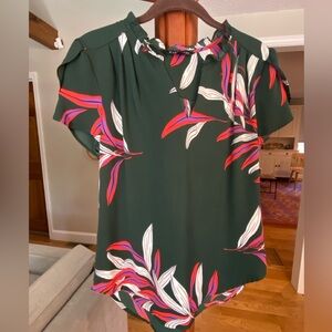 Hawthorne short sleeved dark green blouse with tropical print.
